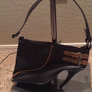 A  Gianni genuine faux leather shoe purse